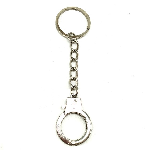 Handcuffs fashion accessory. Novelty size in various designs