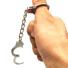 Handcuffs fashion accessory. Novelty size in various designs